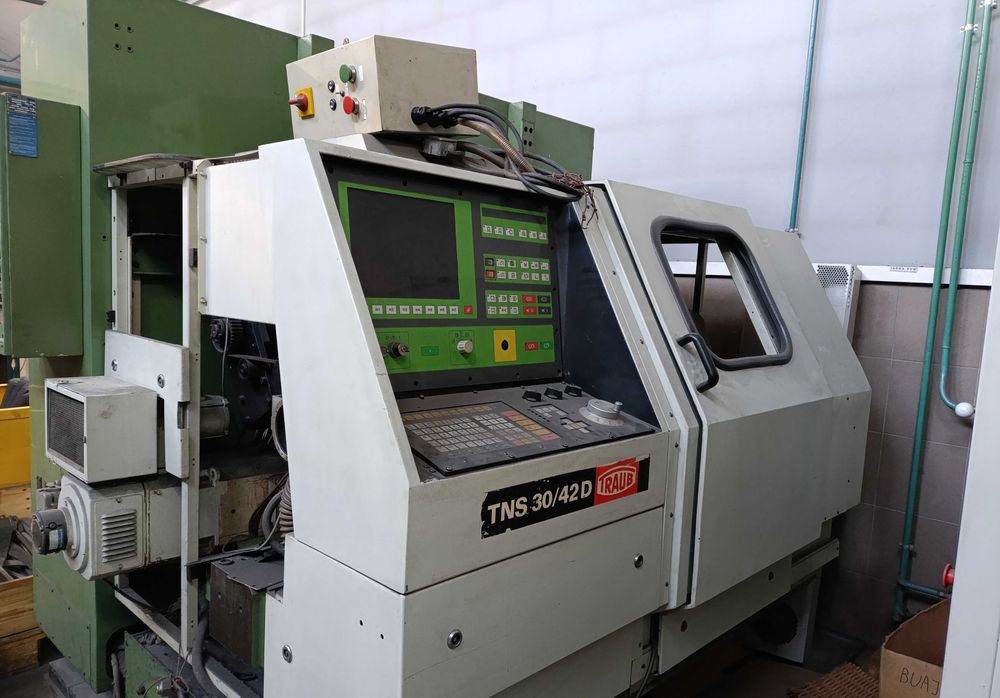 Tokarka CNC TRAUB TNC 30/42D (niesprawna, niekompletna)