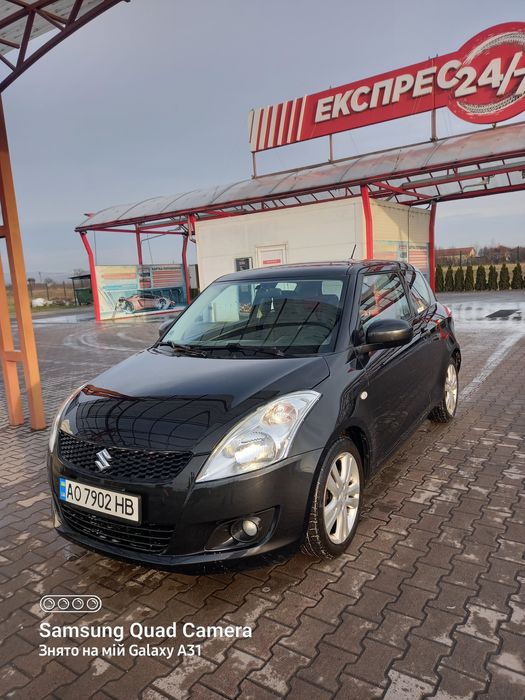 Машина Suzuki Swift 2014p