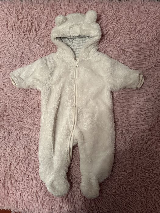 Плюшевий чоловічок Next для новонародженого