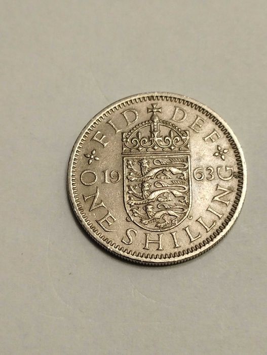Sprzedam monetę Wielka Brytania 1 szyling 1963r. Elżbieta II stan db.