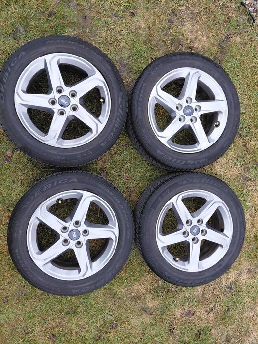 Oryginalne alufelgi 16 cali Ford z oponami całorocznymi