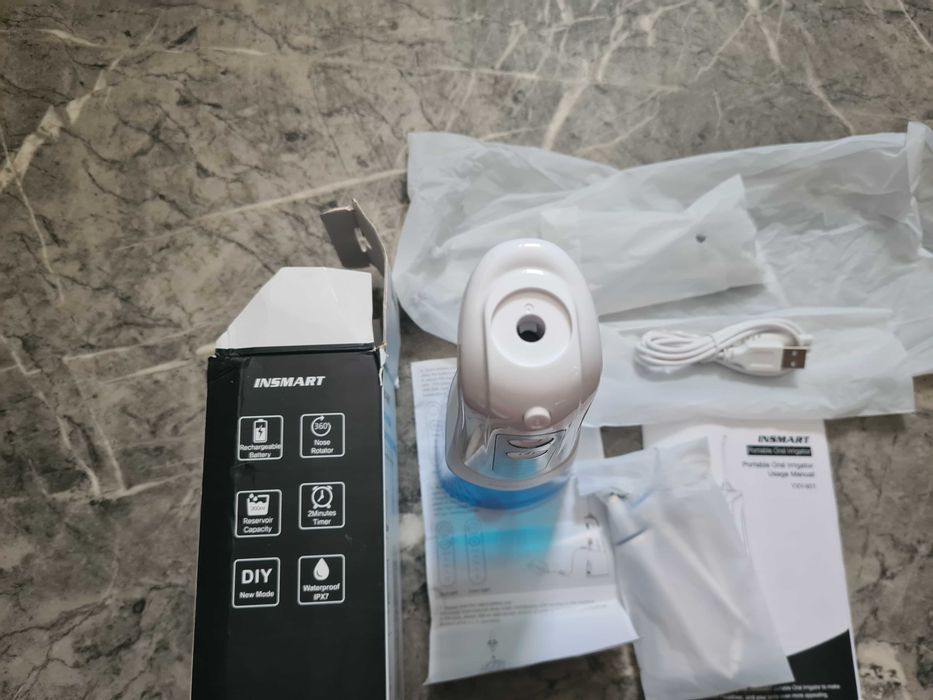 IRYGAToR ma 4 tryby mycia zębów 300ml + 6 różnych dysz końcówek
