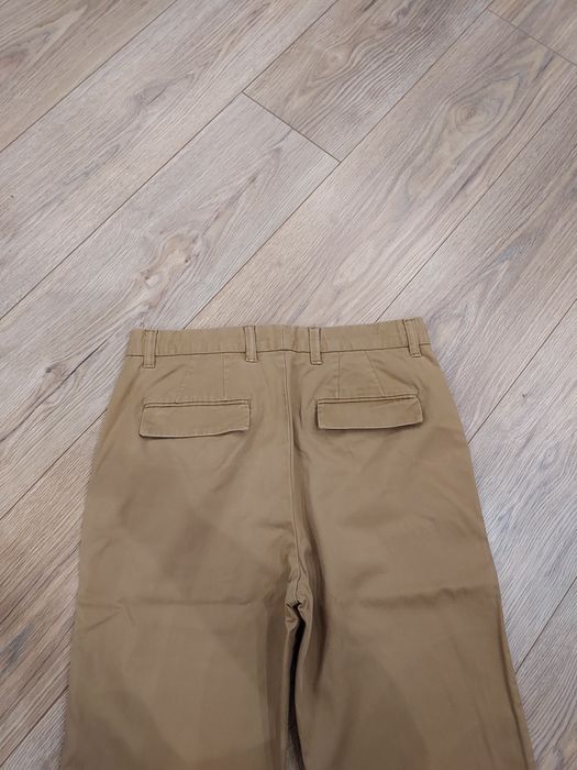 Eleganckie  brązowe spodnie męskie zara