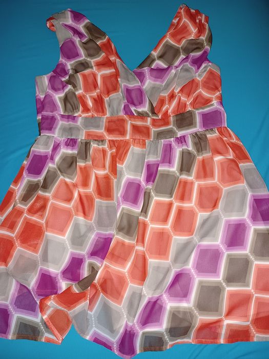 Sukienka  maskującą niedoskonałości