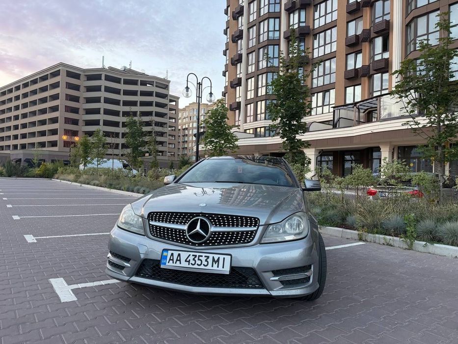 Mercedes-Benz C-Class 2014 VIN WDDGJ4HB2FG371207 фото оголошення 12 з 15