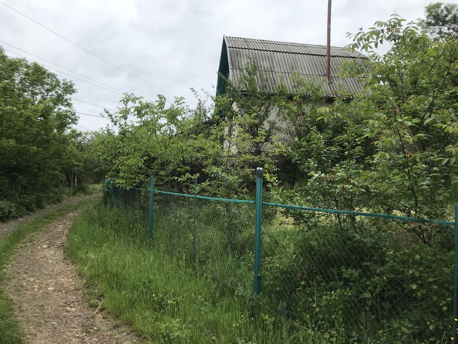 Ділянка з будинком