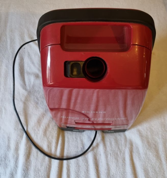 Aspirador Antigo a trabalhar