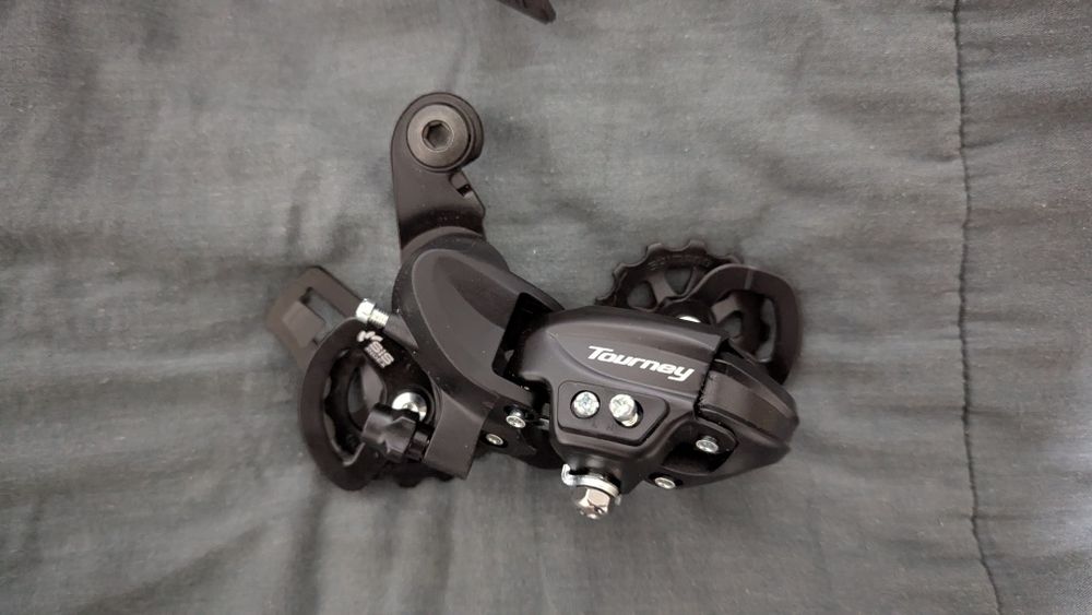 Задній перемикач shimano tourney
