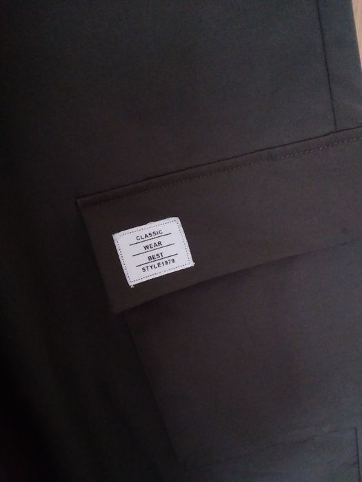 Calças desportivas com bolsos laterais tam. L verdes