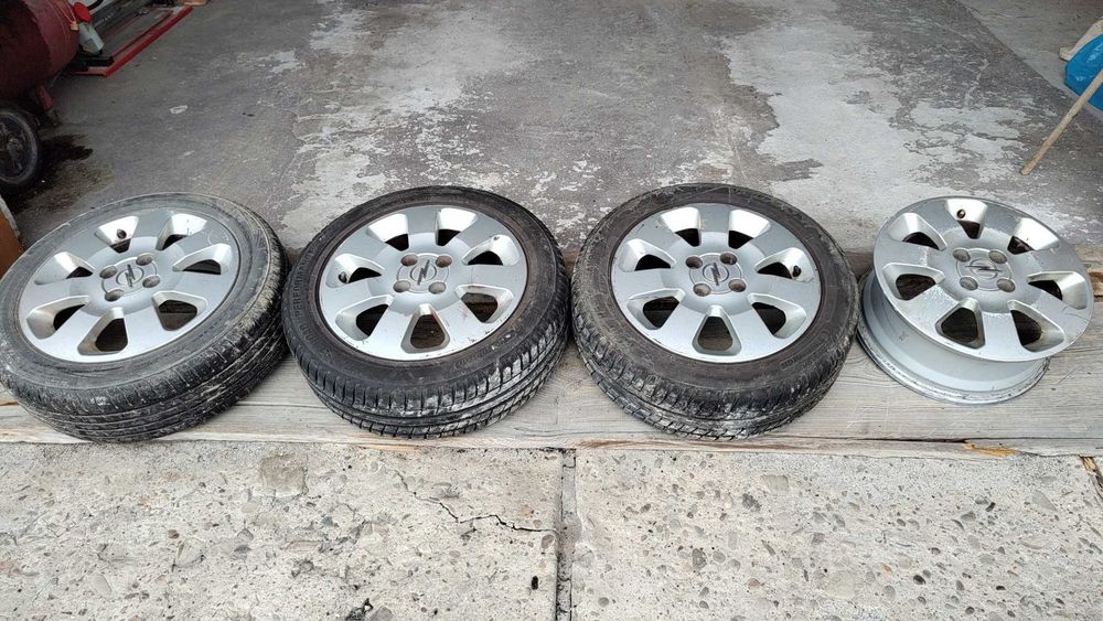 Alufelgi  4szt Opel 6Jx15 ET49 4x100 + 3 opony letnie 185/55 R15