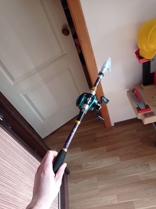 Новый спиннинг 1.8м с мультипликаторной катушкой.