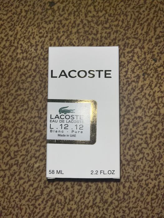 Духи Lacoste від UAE