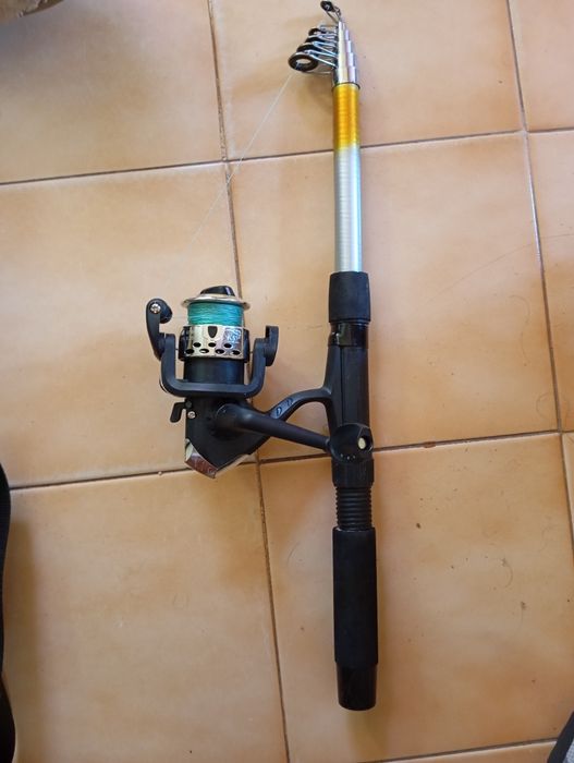 2 Canas de pesca  c/ carrete usadas