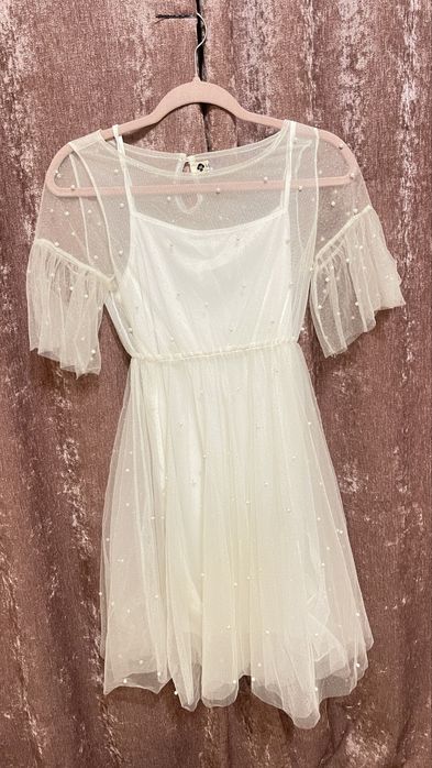 Платя нове одягала один рас