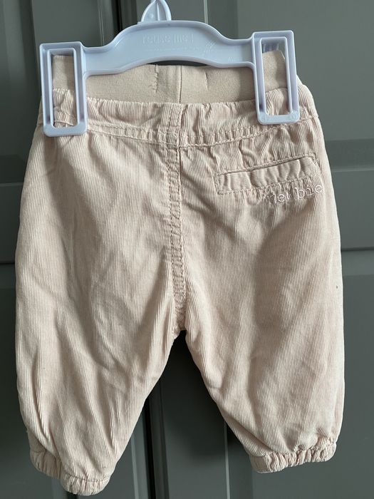 Nowe spodnie sztruksowe z podszewką Newbie 62cm