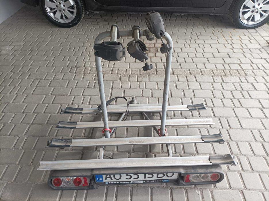 Кріплення для 4 велосипедів на фаркоп Menabo Race 4