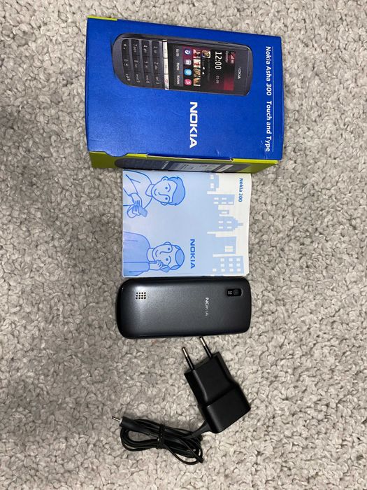 Мобільний телефон Nokia Asha 300 Graphite мобильный сенсорный
