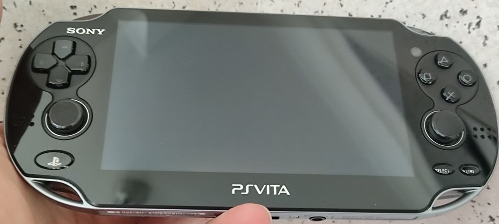 PS Vita c/ 3 jogos e capa Lamborghini