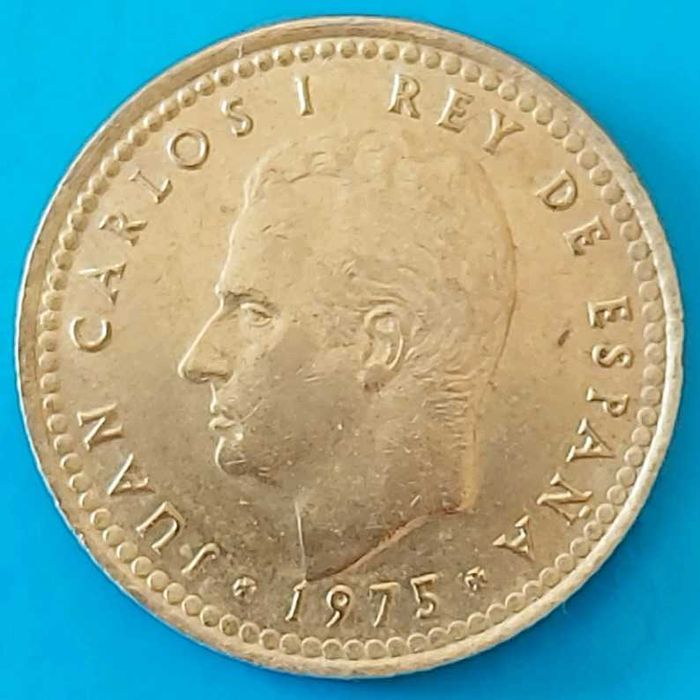 Una Peseta de 1975 com *79* na estrela, Espanha