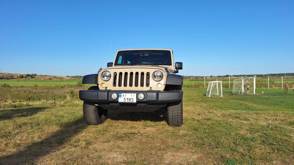 Jeep Wrangler 2016 VIN 1C4AJWAG9GL282101 фото оголошення 2 з 21