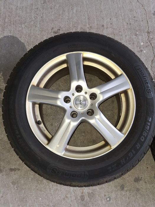 Opony zimowe z felgami 215/60 R16 komplet
