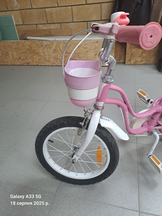 Продам рожевий велосипед