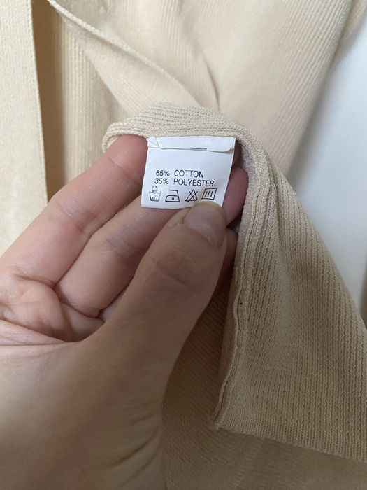 Zapinana bluzka z haftowanymi elementami