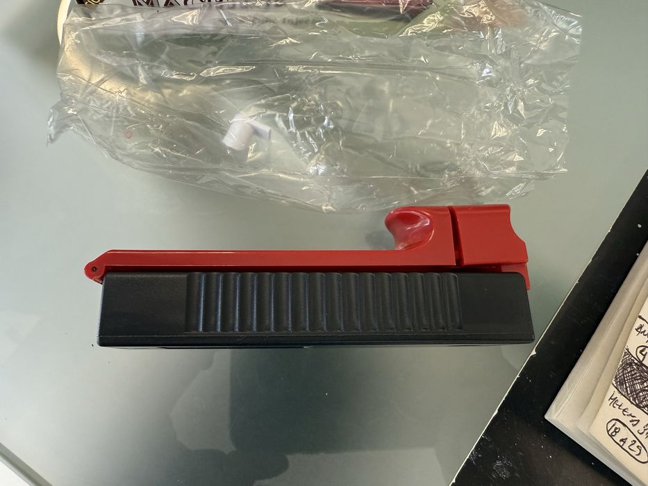 Maquina de entolar cigarros