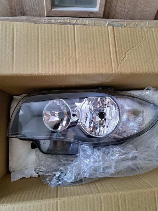 NOWE Reflektory BMW E87 E81 + ślizgi reflektorów