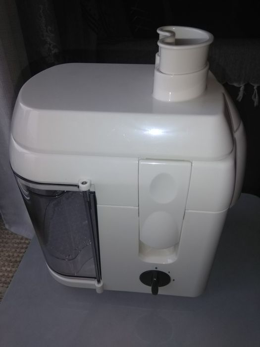 Máquina para extracção de sumos