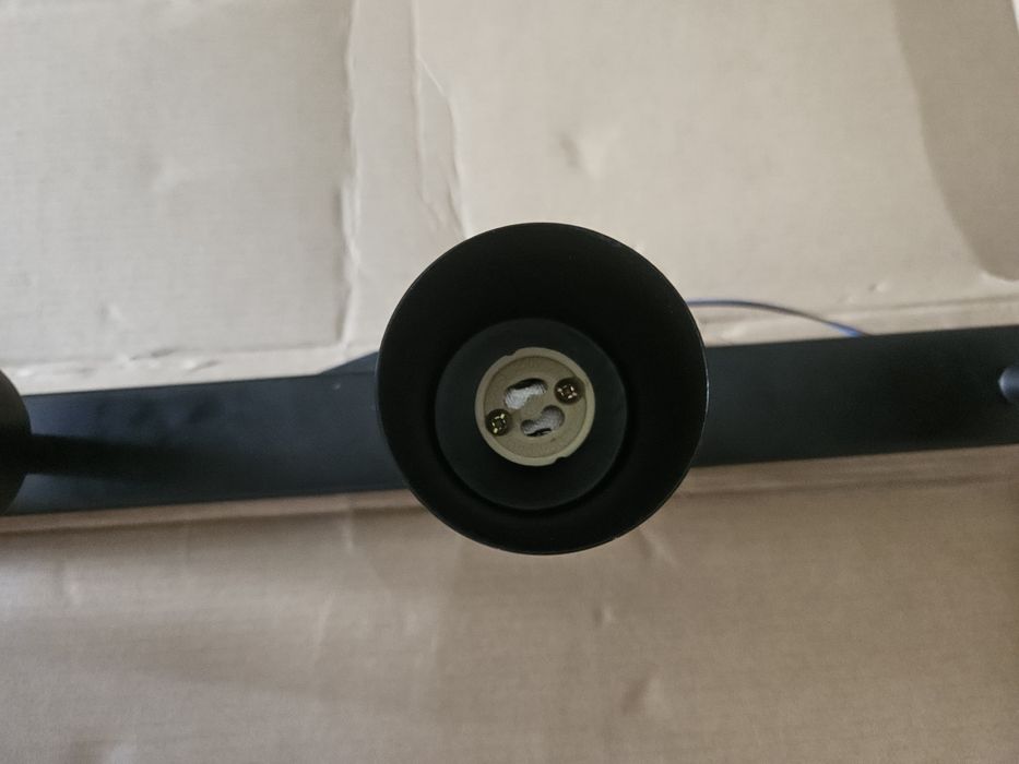 Vendo um caderno  preto  de 4 lâmpadas