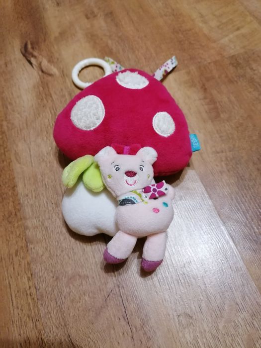 Продам детские игрушки (игрушка на коляску,юла, мягкие игрушки)