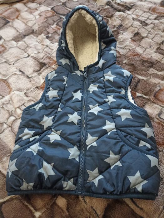 Тепла жилетка приблизно на 3-4 роки