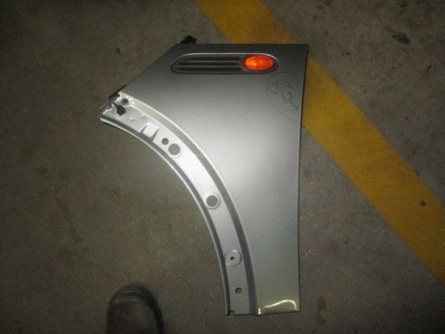 Guarda-lamas esquerdo MINI Mini (R50, R53)
