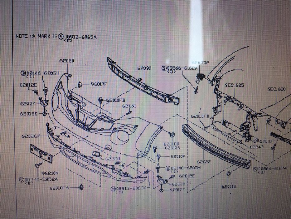 Передний усилитель бампера USA новый в оригинале на NISSAN JUKE рест
