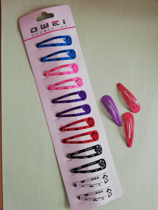 Peças artesanais em feltro, tecido e outros materiais