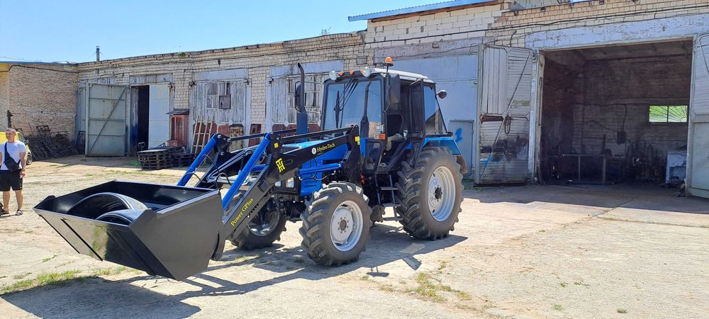 Быстросйомный фронтальный погрузчик кун Юмз