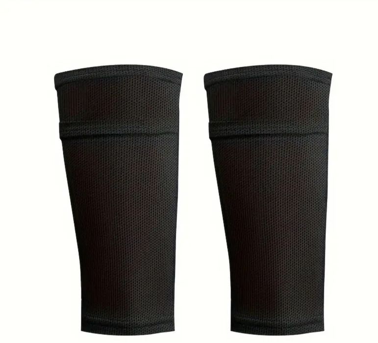 Тримачі  для футбольних щитків