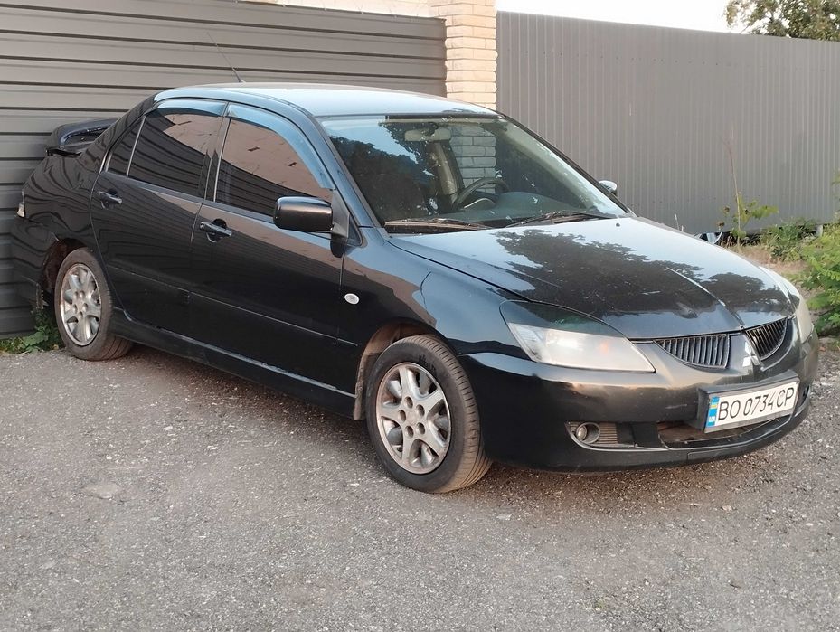 Mitsubishi Lancer 9 Sport 2006г 2.0 механика газ бензин чёрный 2900$
