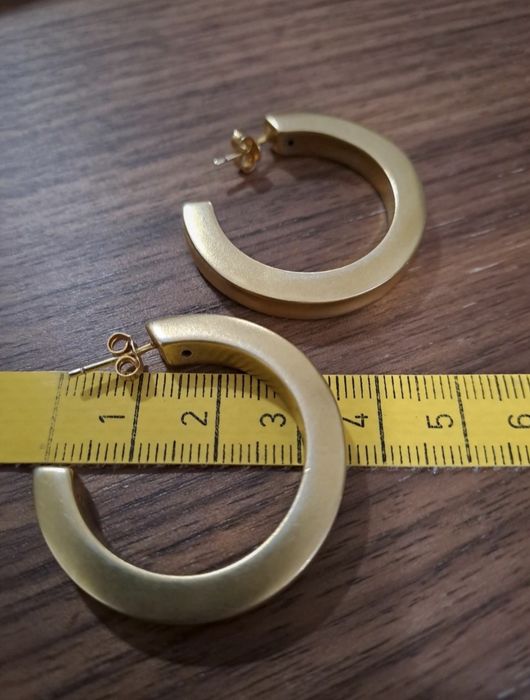 Argolas prata dourada novas