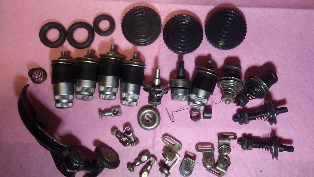 Запчастини для швейних машин і оверлоків.