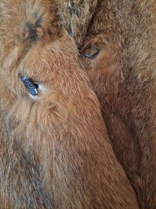 Casaco de pêlo castanho