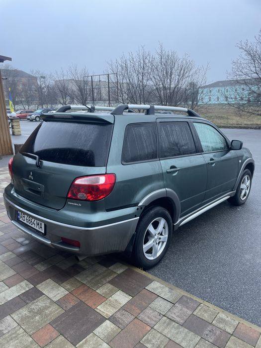 Аутдендер 2007р. 2.4 бензин автомат. 4х4. Тимчасовий облік 4199$