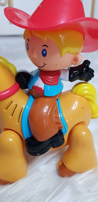 Dumel Discovery galopujący kowboj na koniu zabawka z dźwiękiem muzyką