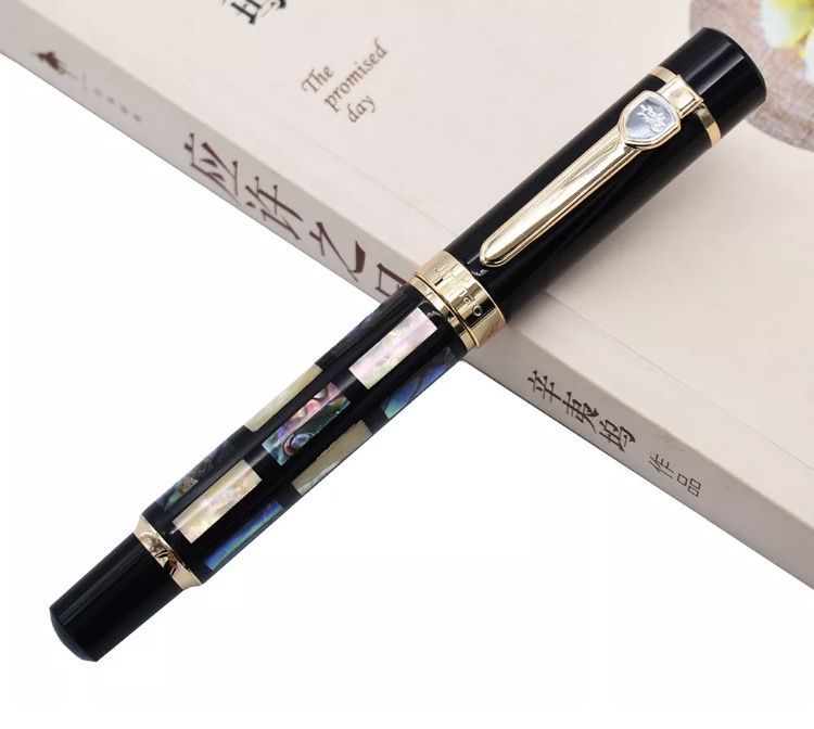 Jinhao caneta de tinta permanente madreperola e aparo média. Nova