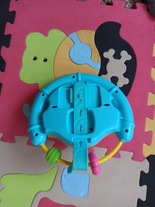 Дитяча іграшка на коляску