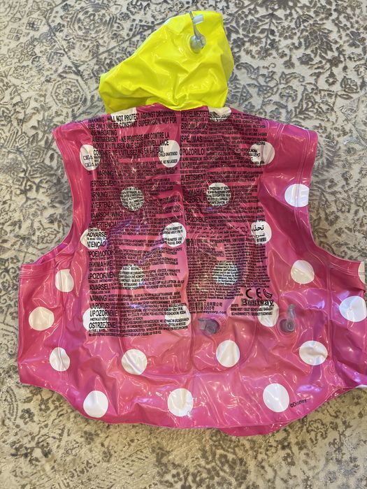 Надувний жилет для дівчинки