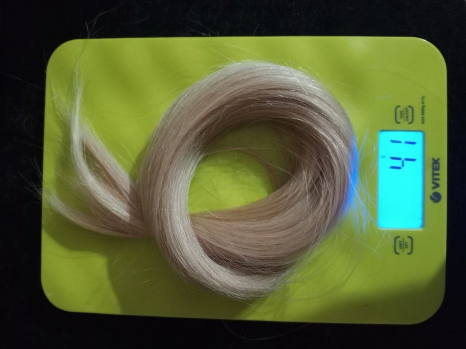 Волосся слов'янське натуральне світле та чорні на тресах