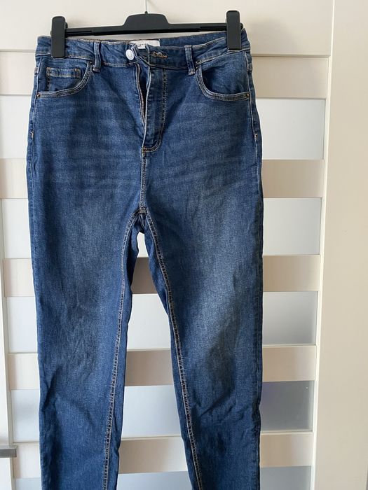 Spodnie dzinsowe reserved 44