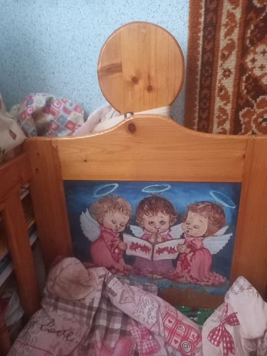 Дерев'яне дитяче ліжечко